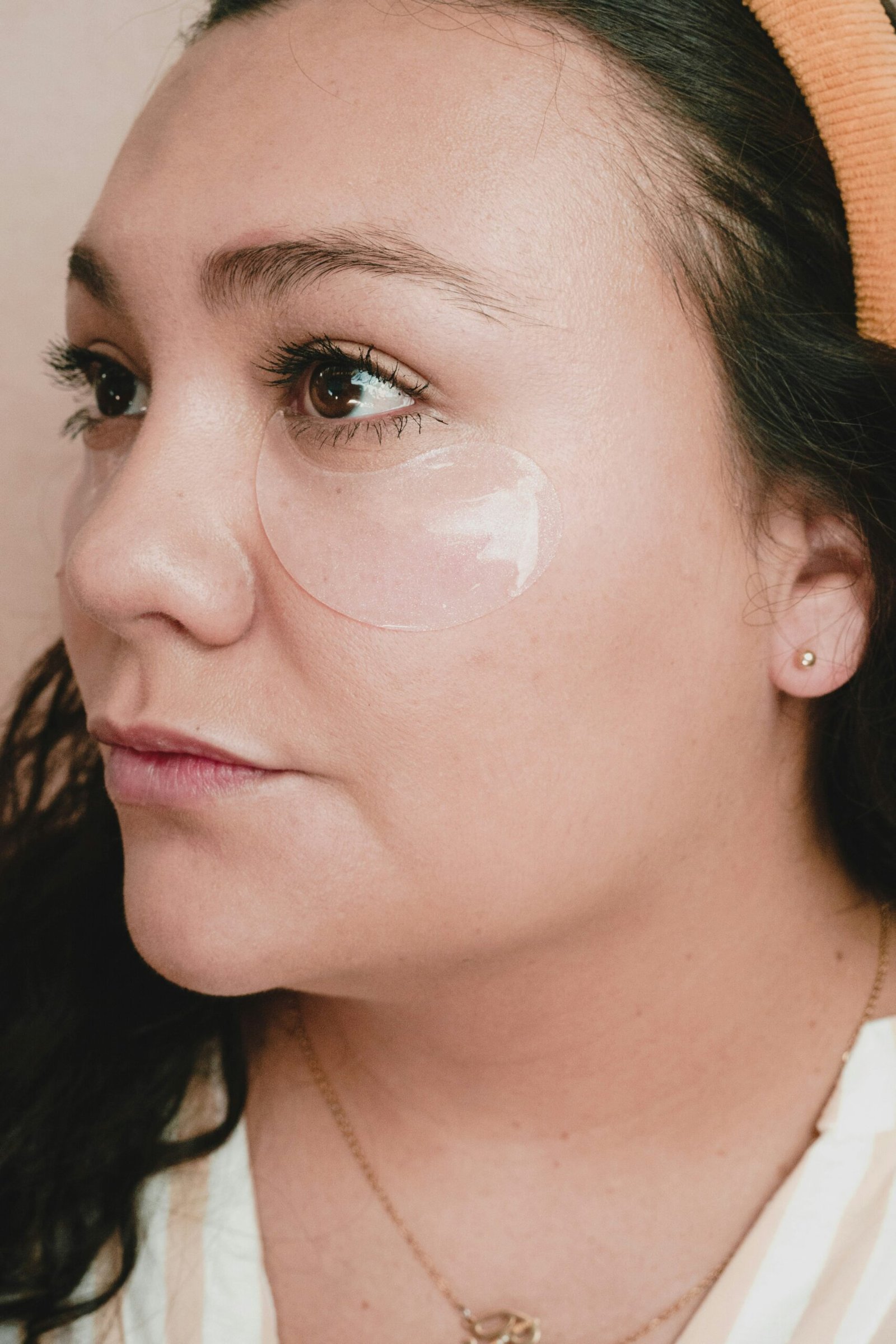 a close up of a person wearing a hat